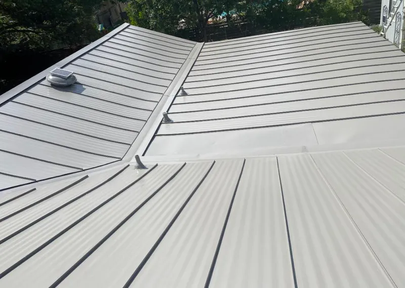 Solar attic fan installed on a metal roof for Roof Ventilation in Rio Linda